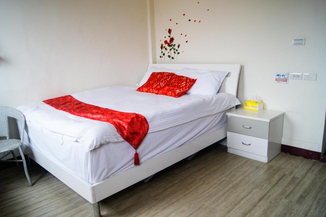 Ding Ding Homestay Цзіньху Номер фото