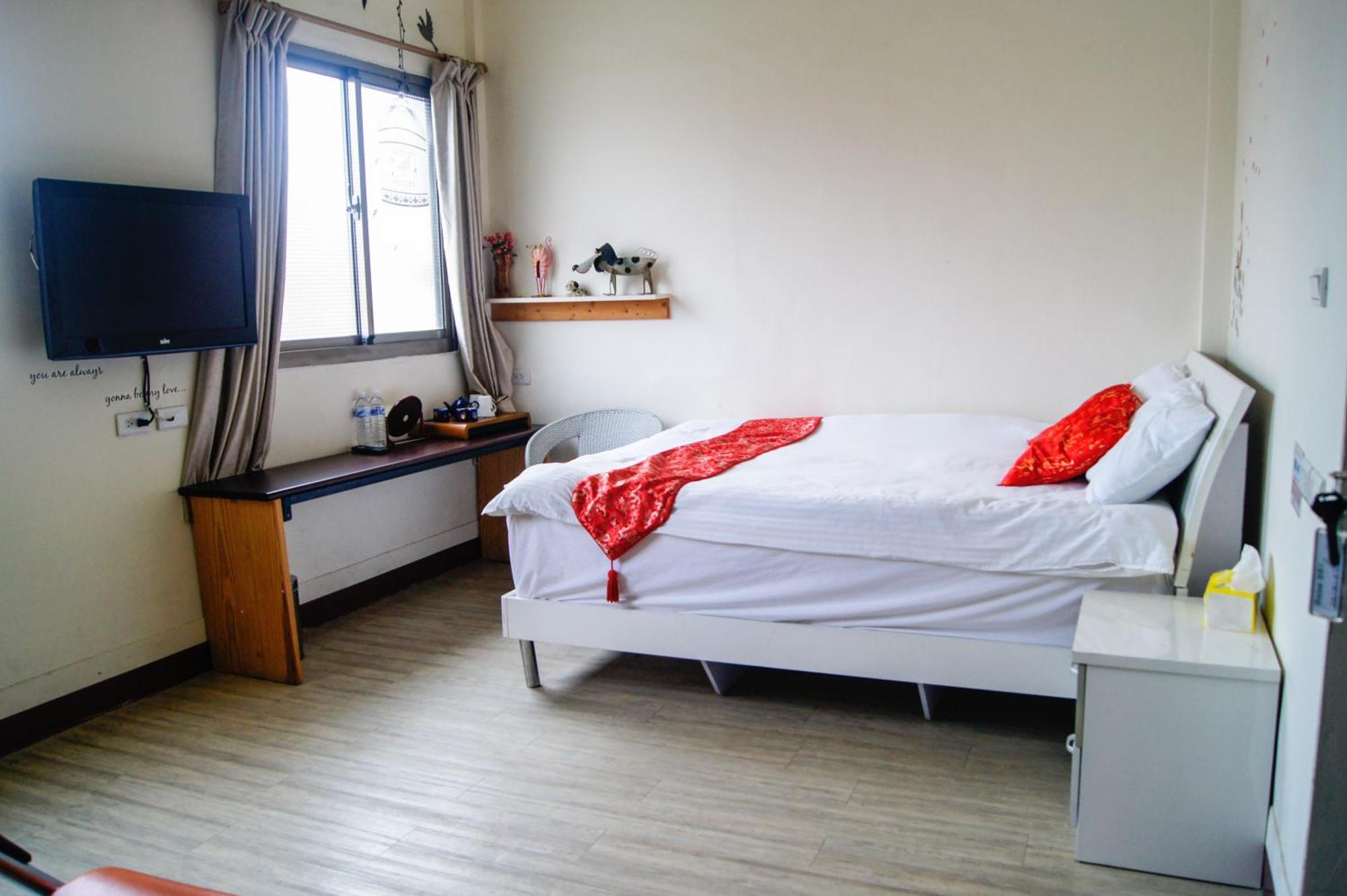Ding Ding Homestay Цзіньху Номер фото