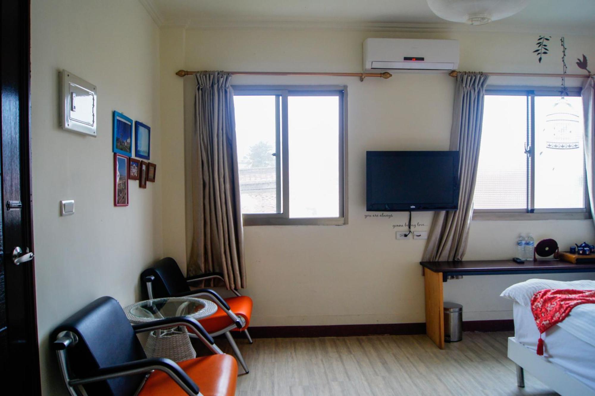 Ding Ding Homestay Цзіньху Номер фото