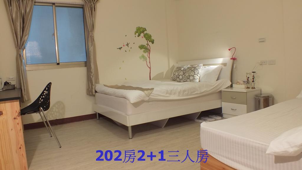 Ding Ding Homestay Цзіньху Номер фото