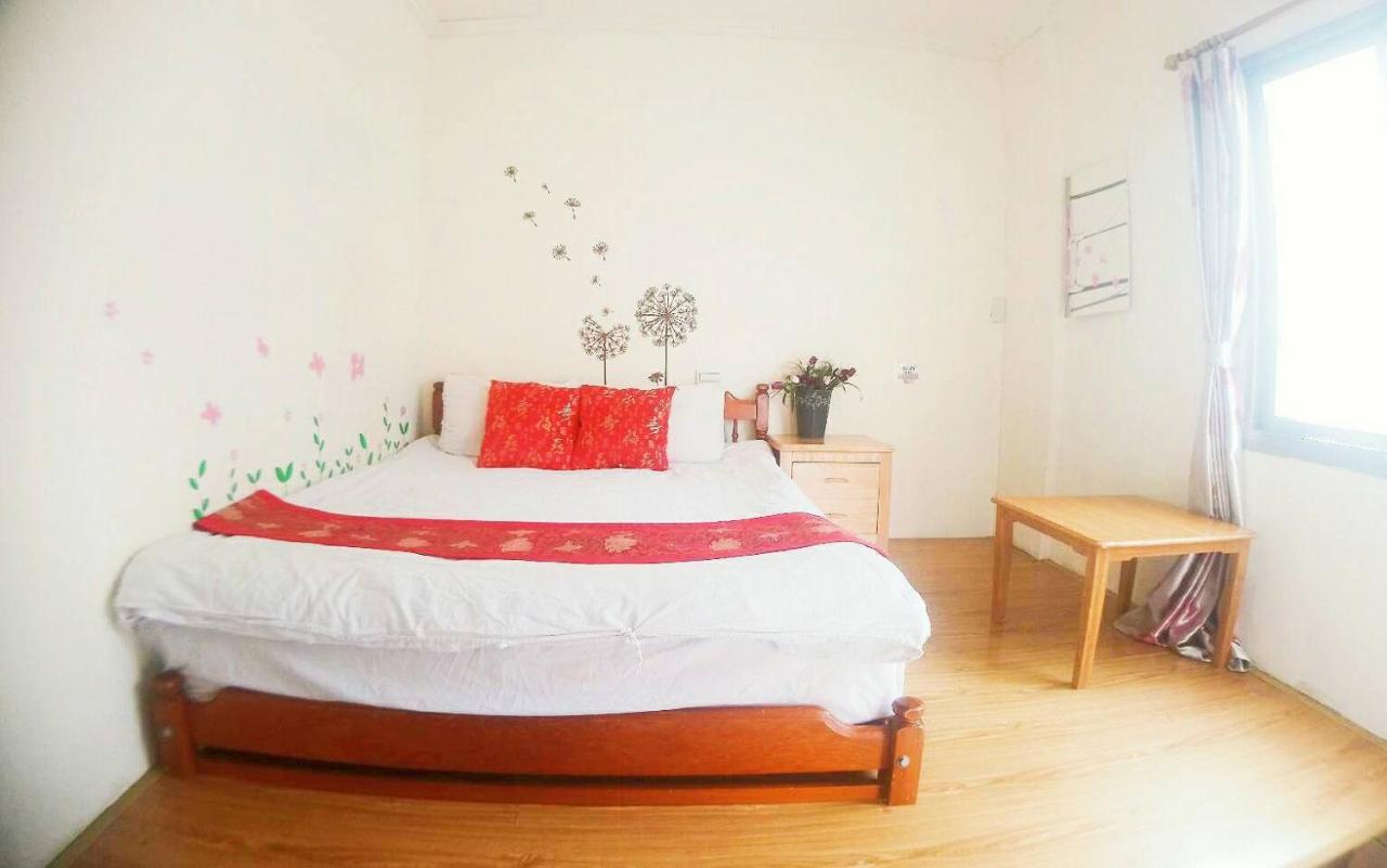 Ding Ding Homestay Цзіньху Екстер'єр фото